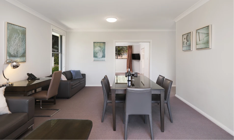 Riverside Oaks Executive Suite lounge and dining area