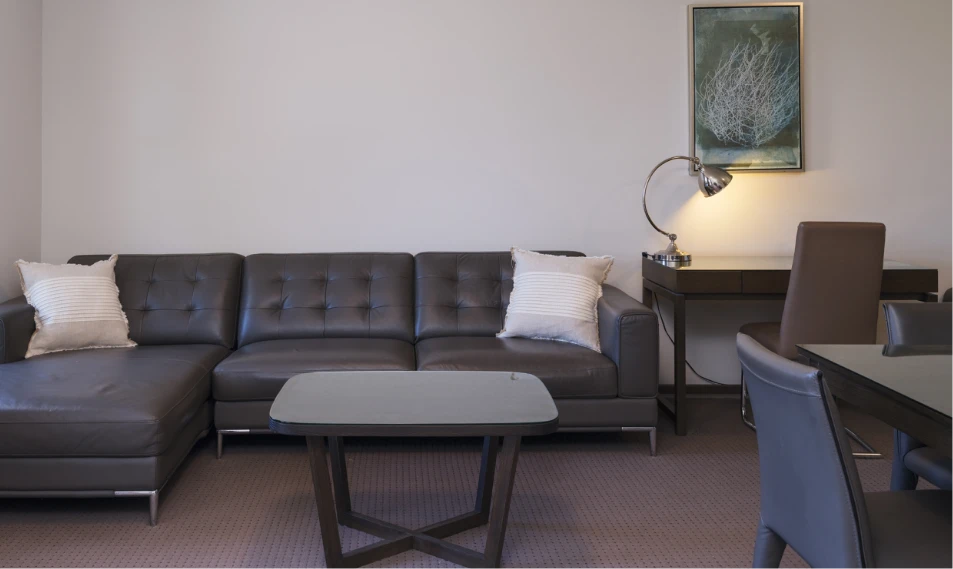 Riverside Oaks Executive Suite lounge and work desk