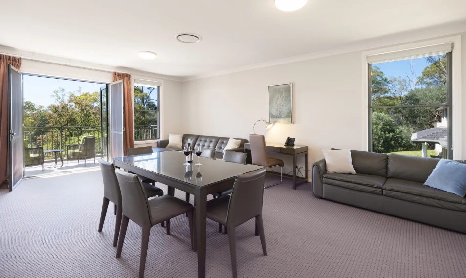 Riverside Oaks Executive Suite open plan living with balcony access