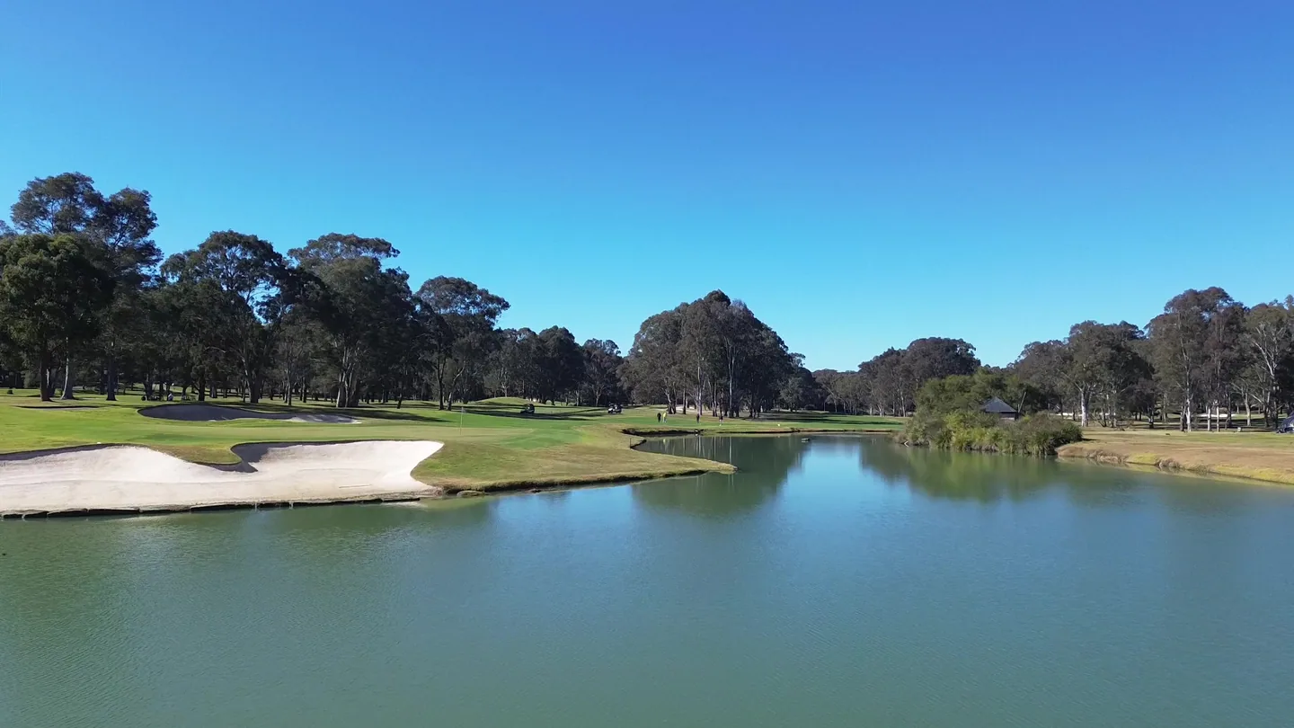 Riverside Oaks Golf Resort fairway across the lake