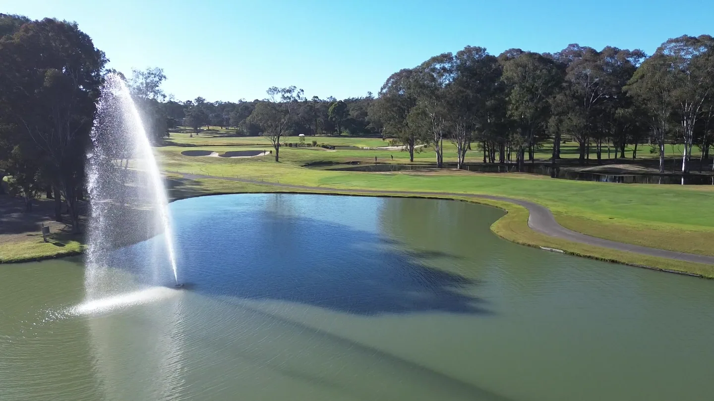 Water carry approach at Riverside Oaks Golf Resort