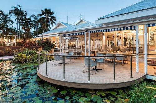 oaks-port-douglas-resort-restaurant-outdoor-dining-pond-railing-1920-x-1080.jpg