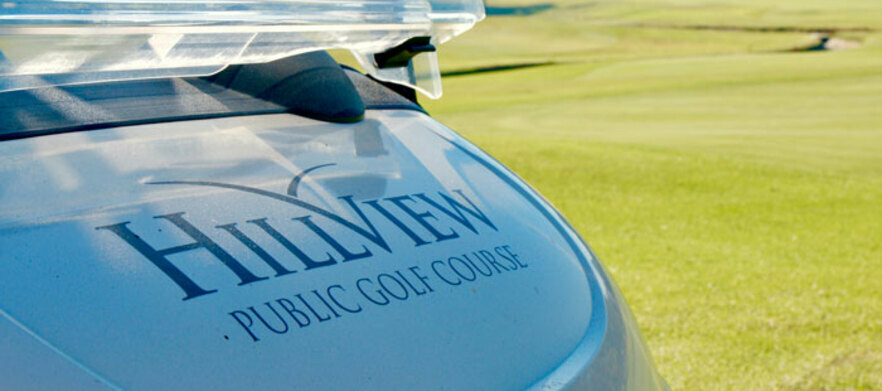 18 Holes For Two at the stunning  <em>Hillview Golf Course!</em> Includes a shared motorised cart & a bucket of range balls to share.